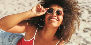 Woman on vacation, traveling more to live longer. 